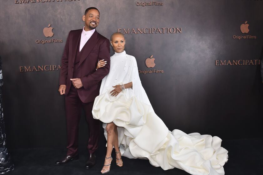 Will Smith, left, and Jada Pinkett Smith arrive at the premiere of "Emancipation" on Wednesday, Nov. 30, 2022, at the Regency Village Theatre in Los Angeles. (Photo by Jordan Strauss/Invision/AP)