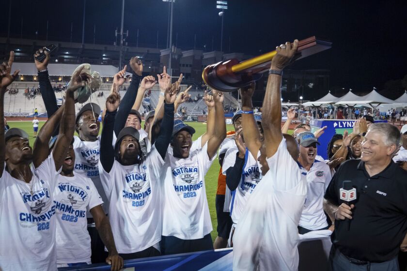 Florida celebrates after winning the men's title at the NCAA outdoor track and field championships Friday, June 9, 2023, in Austin, Texas. (Sara Diggins/Austin American-Statesman via AP)