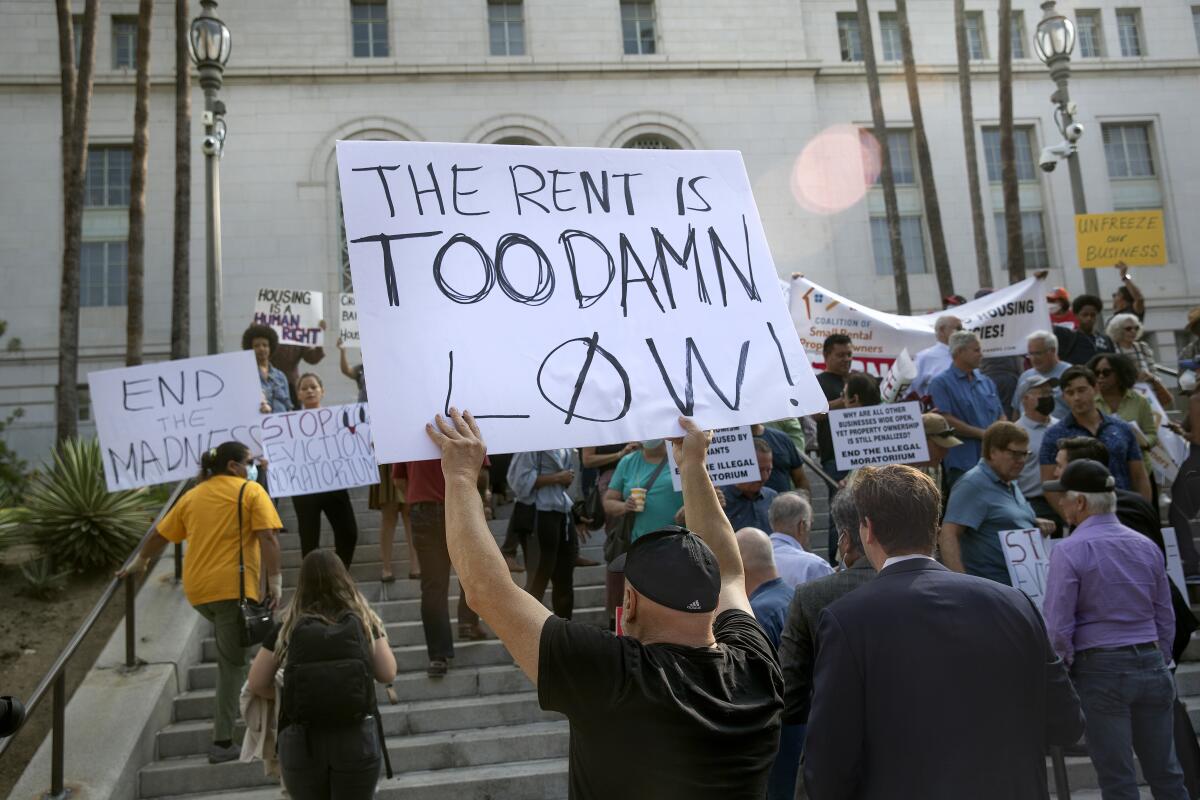 People rally outside of Los Angeles City Hall in July.