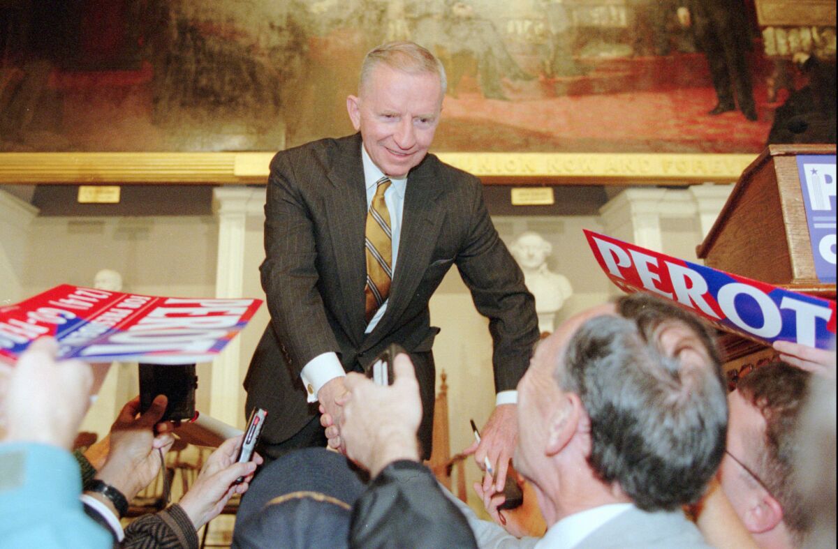Reform Party presidential candidate Ross Perot shakes hands with supporters following a speech at Faneuil Hall in Boston on Oct. 30, 1996. Although he didn't win the presidency, Perot had a profound impact on the election and on the issues discussed.