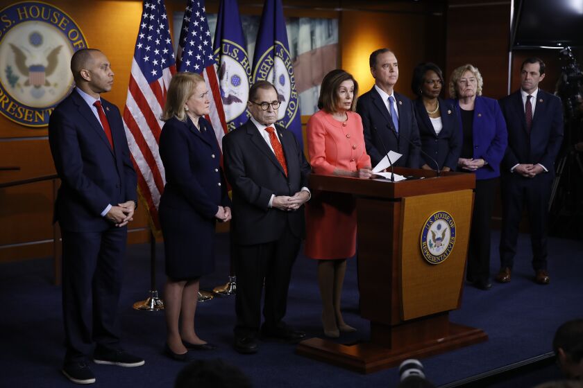 House Speaker Nancy Pelosi of Calif., speaks during a news conference to announce impeachment managers on Capitol Hill in Washington, Wednesday, Jan. 15, 2020. With Pelosi from left are Rep. Hakeem Jeffries, D-N.Y., Rep. Sylvia Garcia, D-Texas, House Judiciary Committee, Rep. Jerrold Nadler, D-N.Y., Pelosi, House Intelligence Committee Chairman Adam Schiff, D-Calif., Rep. Val Demings, D-Fla., Rep. Zoe Lofgren, D-Calif. and Rep. Jason Crow, D-Colo. (AP Photo/Matt Rourke)