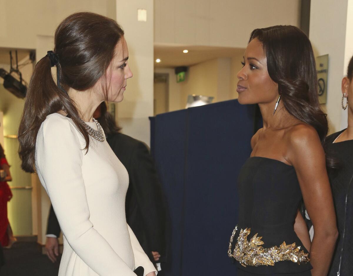 Britain's Catherine, Duchess of Cambridge, speaks to actress Naomie Harris during the British premiere of "Mandela: Long Walk to Freedom" on Thursday. Harris plays Winnie Mandela in the film.