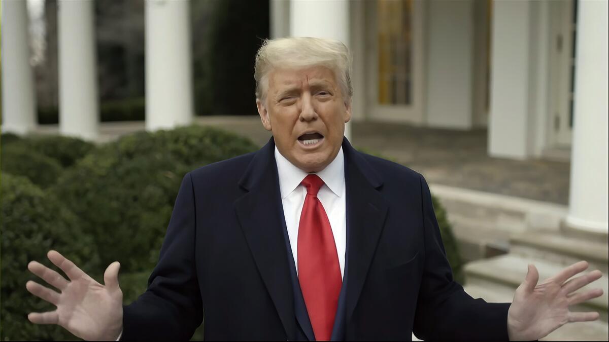 Donald Trump gesturing while he speaks from the White House Rose Garden on Jan. 6, 2021.