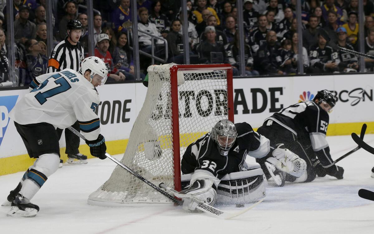 Kings goalie Jonathan Quick stops the shot of Sharks center Tommy Wingels during the second period of Game 1.