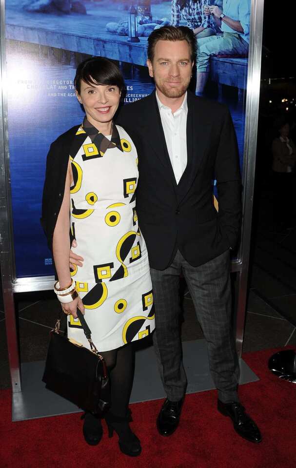 Ewan McGregor, posing with his wife Eve Mavrakis, plays a fisheries expert named Dr. Alfred Jones who is asked to bring fly fishing to the desert.