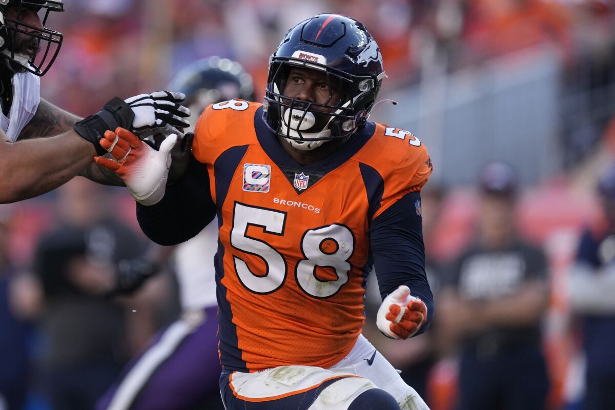 Von Miller tries to break through the Baltimore Ravens' offensive line Oct. 3.
