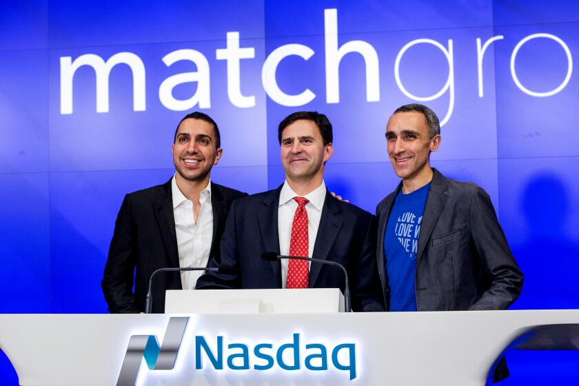 Tinder co-founder Sean Rad, left, with former Match Group CEO Greg Blatt, center, and OkCupid co-founder Sam Yagan in 2015. Blatt says in a defamation suit against Rad that Rad is using a sexual harassment claim by another former Tinder executive to discredit him in a lawsuit over Tinder's valuation. (Andrew Burton/Getty Images/TNS) ** OUTS - ELSENT, FPG, TCN - OUTS **