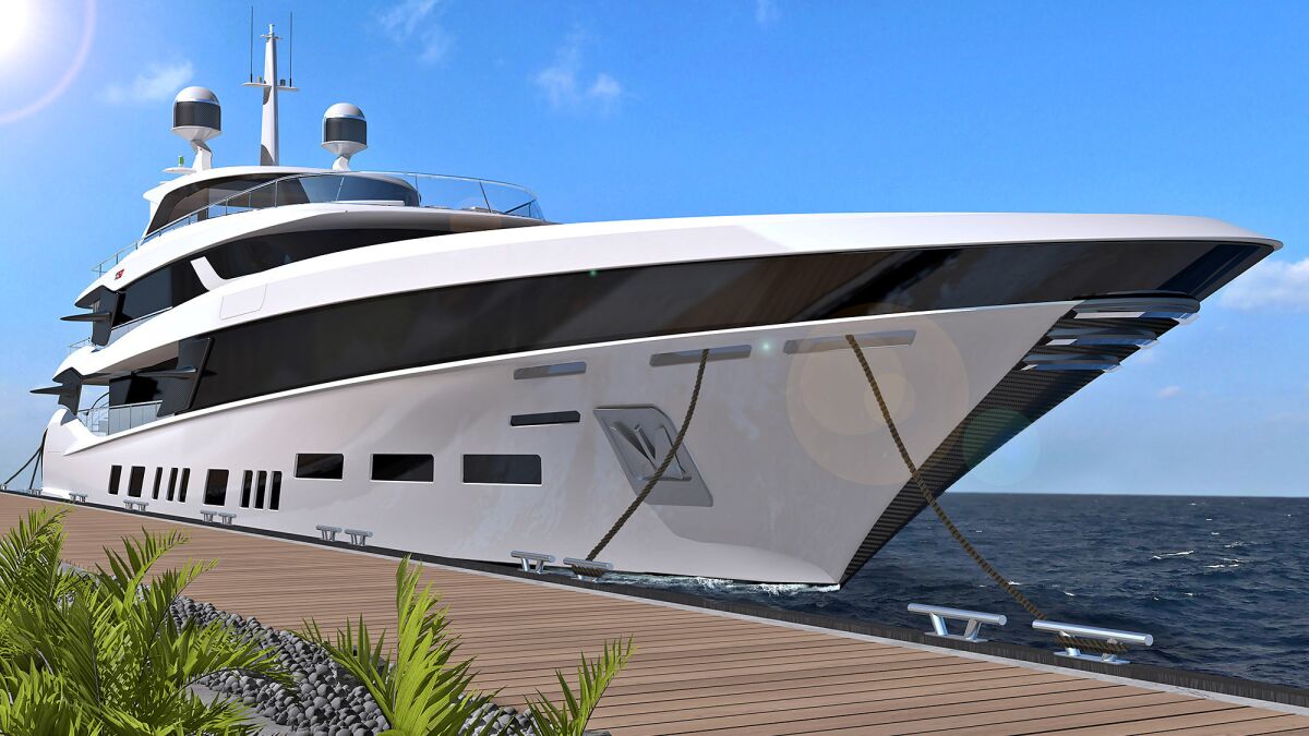 The Fisker 50 luxury yacht sits alongside a dock.
