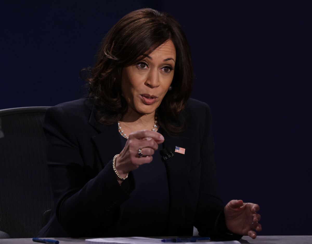 Kamala Harris gestures as she speaks at the debate.
