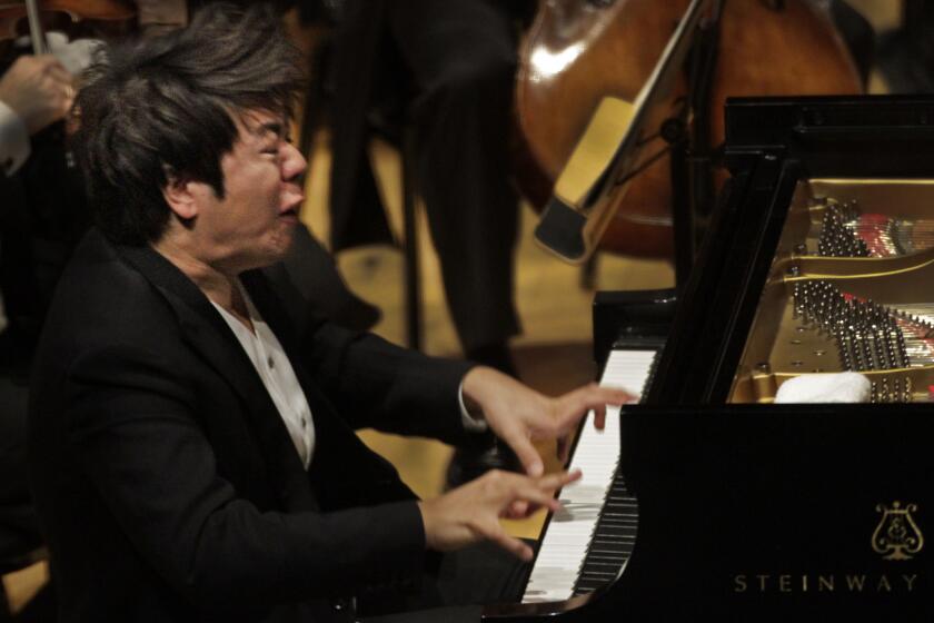 Pianist Lang Lang performs with Gustavo Dudamel conducting the Los Angeles Philharmonic.