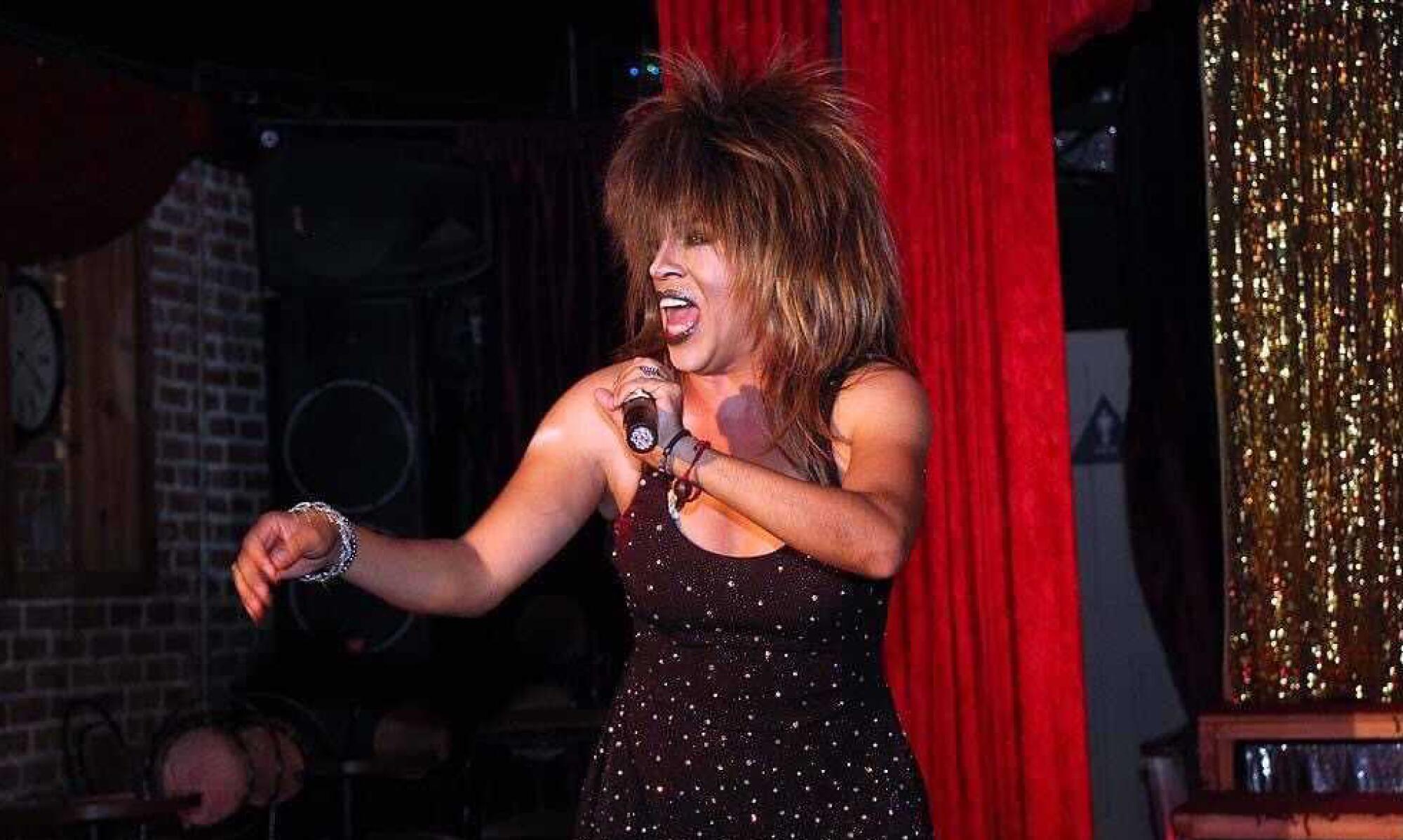 Patty La Tres Pisos performs as Tina Turner during a drag show at the New Jalisco Bar.