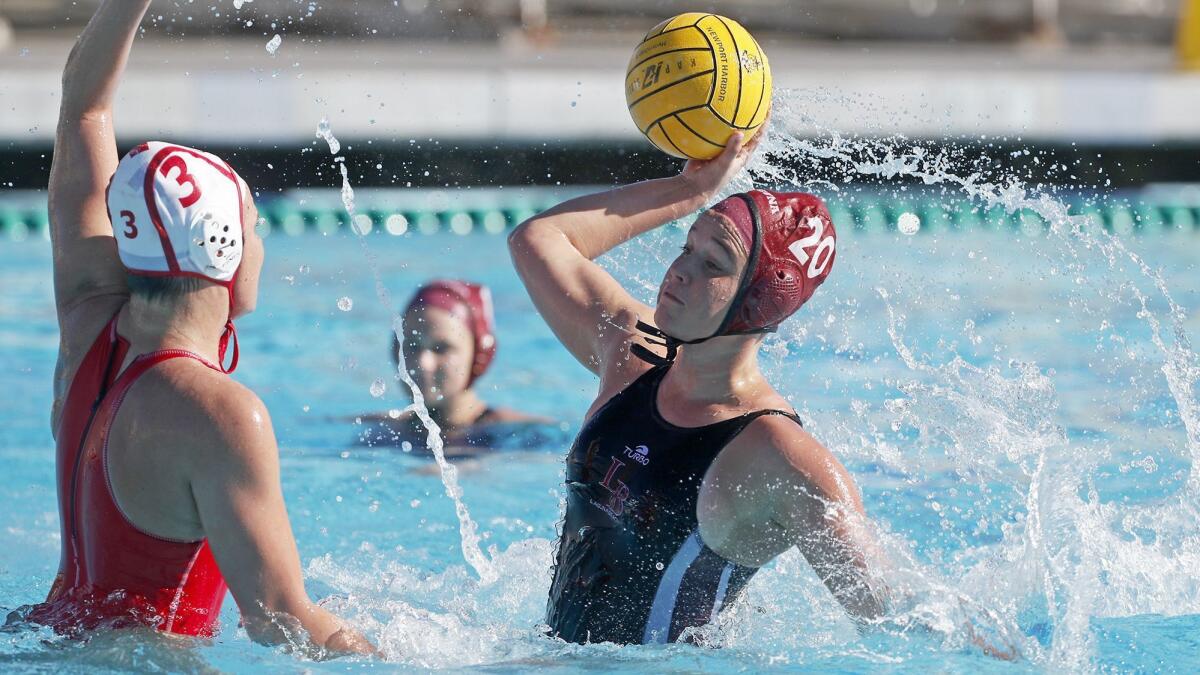 Tea Poljak, right, shown competing against Orange Lutheran on Dec. 29, 2018, has withdrawn from Laguna Beach High.
