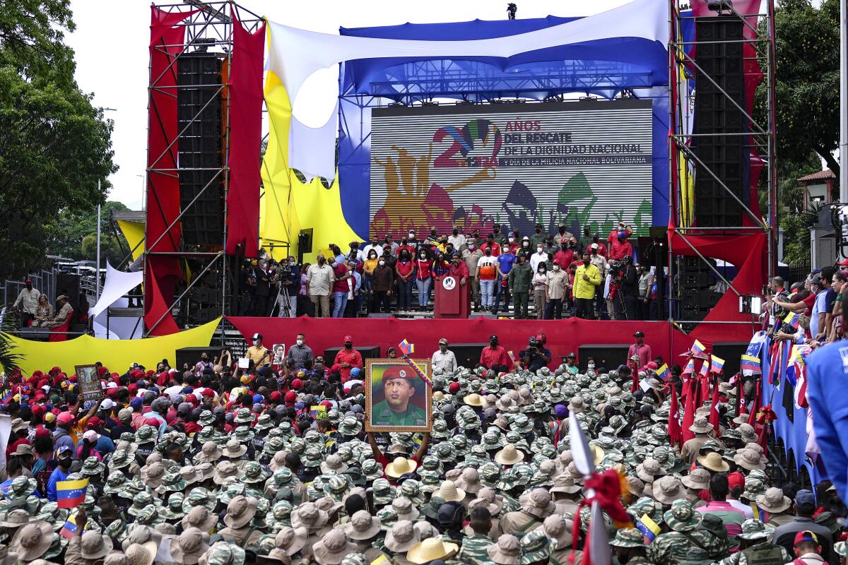 Venezuelan President Nicolas Maduro leads a ceremony commemorating the 20th anniversary of Hugo Chávez's return to power.