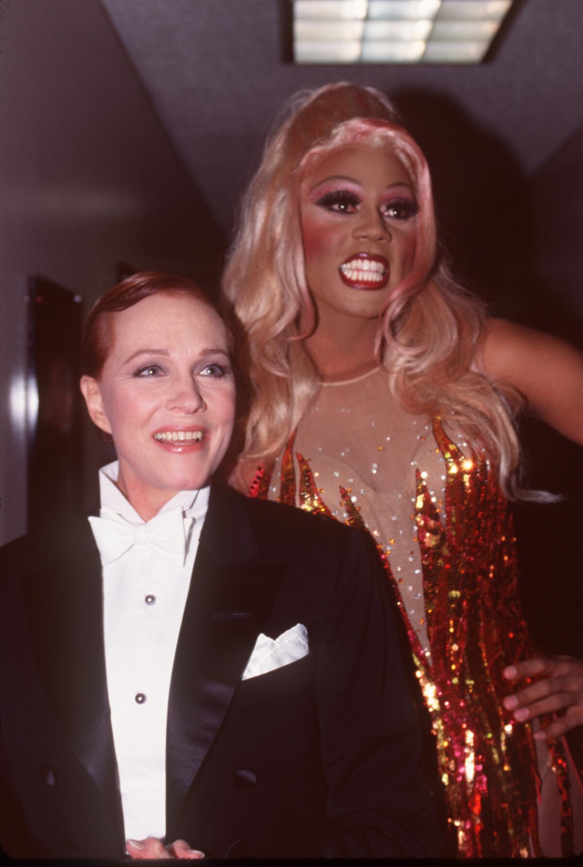 Julie Andrews and RuPaul at the Commitment to Life AIDS benefit in 1995.