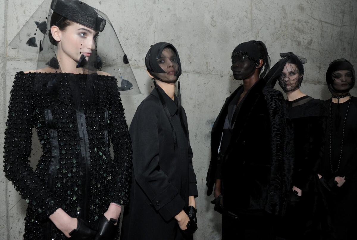 Thom Browne's mourning-wear-as-high-fashion look.