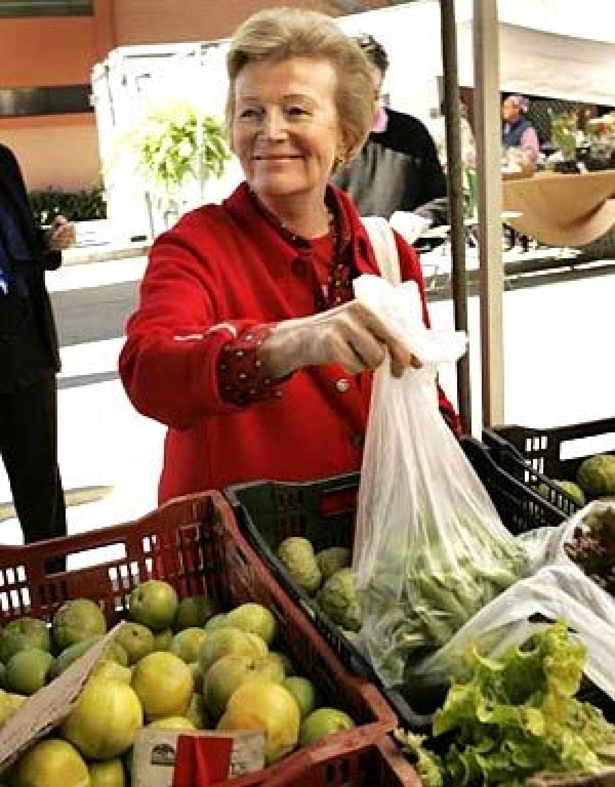 TRANSPLANT: Famed cooking instructor and author Anne Willan shops at a Santa Monica Farmers Market recently.