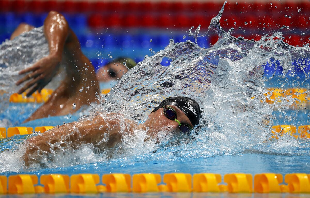 U.S. swimmer Bobby Finke competes in the men's 1,500-meter freestyle Sunday.