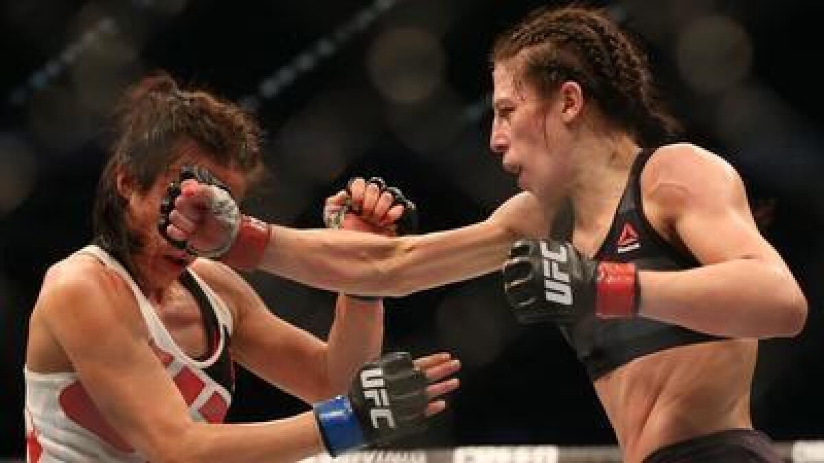 Joanna Jedrzejczyk, right, defeated Valerie Letourneau by unanimous decision at UFC 193 in Melbourne, Australia on Nov. 14, 2015.