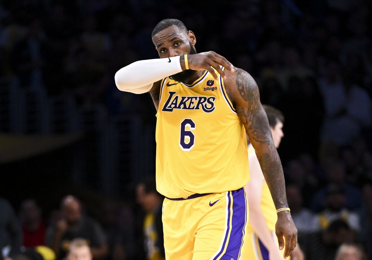 LOS ANGELES, CA - MAY 22: Los Angeles Lakers forward LeBron James wipes his face during the fourth quarter.