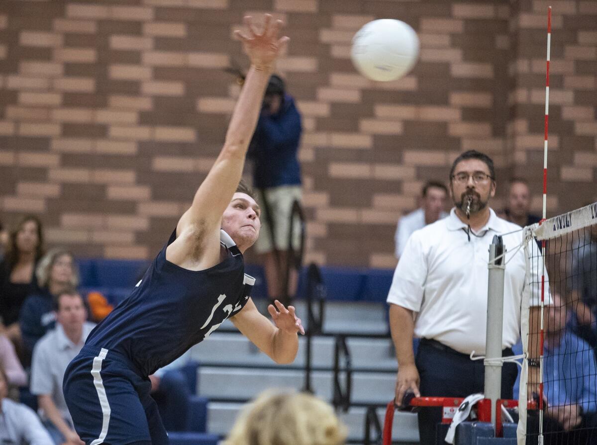 Newport Harbor High's Dayne Chalmers hits during a CIF Southern Section Division 1 semifinal playoff match at Los Angeles Loyola on Wednesday.