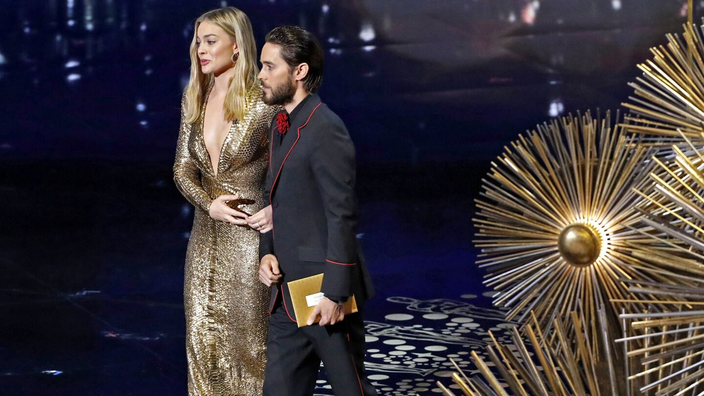 Presenters Margot Robbie and Jared Leto