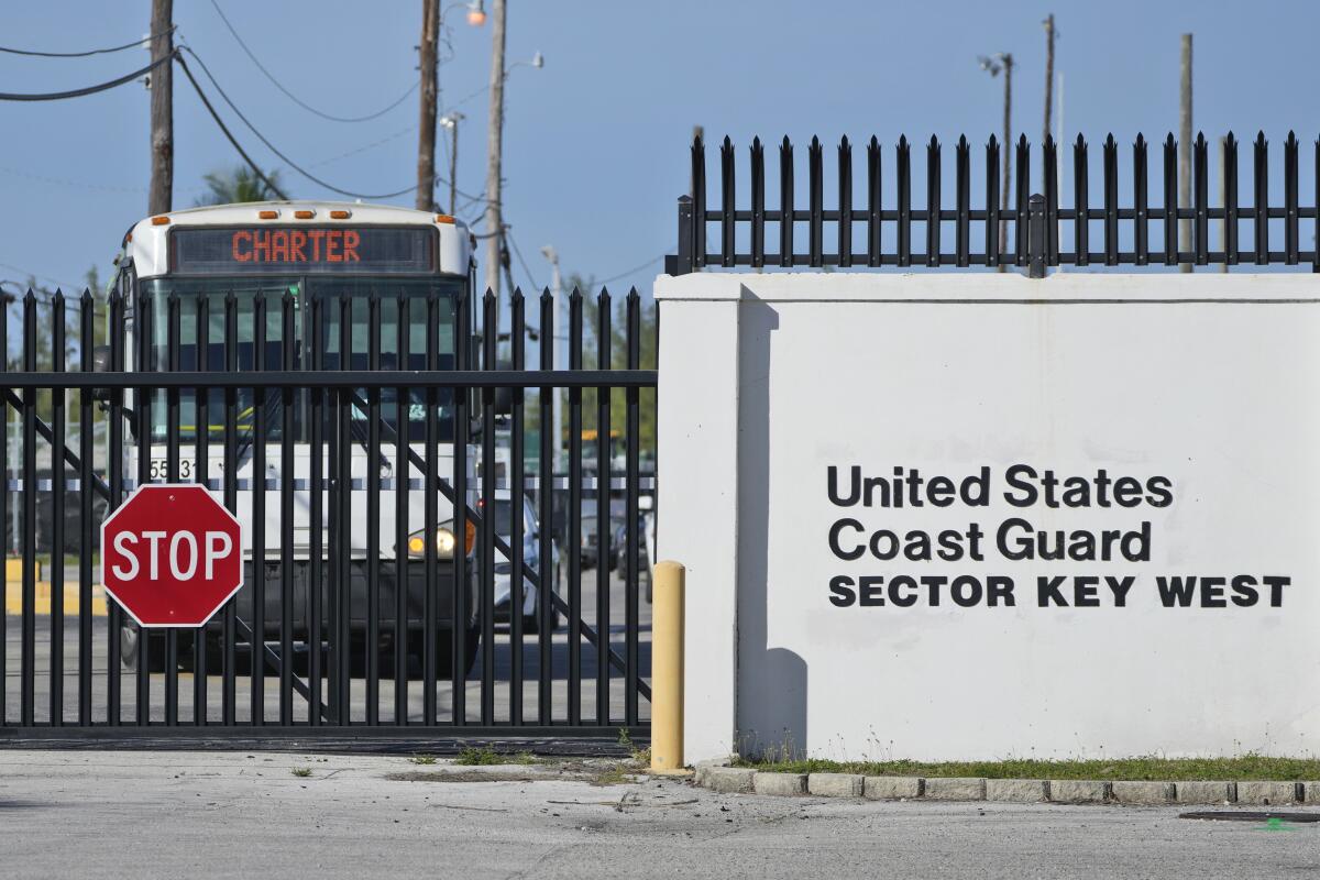 Buses carrying Cuban migrants leave from U.S. Coast Guard Sector Key West.