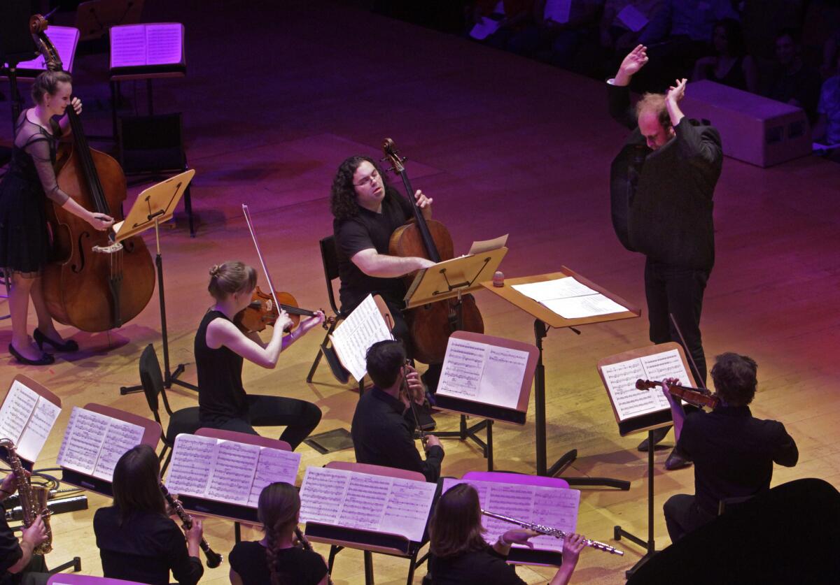 Conductor Christopher Rountree conducting the group wild Up in composer Julius Eastman's "Stay On It" during the Maximum Minimalism at Walt Disney Concert Hall in LA on Apr. 08, 2014.