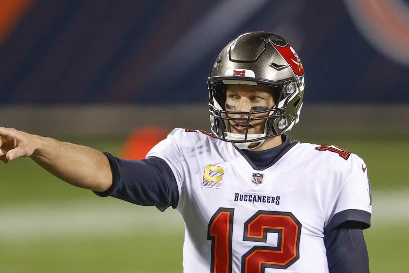 Tampa Bay Buccaneers quarterback Tom Brady (12) in action against the Chicago Bears during the first half of an NFL football game, Thursday, Oct. 8, 2020, in Chicago. (AP Photo/Kamil Krzaczynski)