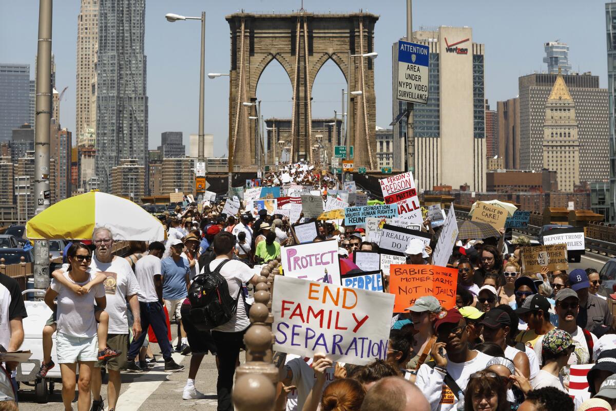 NEW YORK: Thousands march across the Brooklyn Bridge.