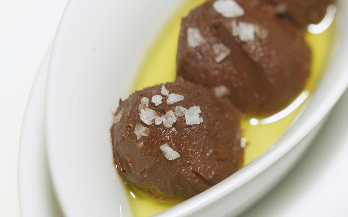 Chocolate mousses with olive oil and flaky salt