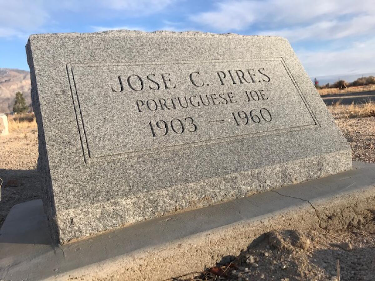A modest granite headstone marks the grave site of Jose C. Pires at Mt. Whitney Cemetery in Lone Pine, Calif.