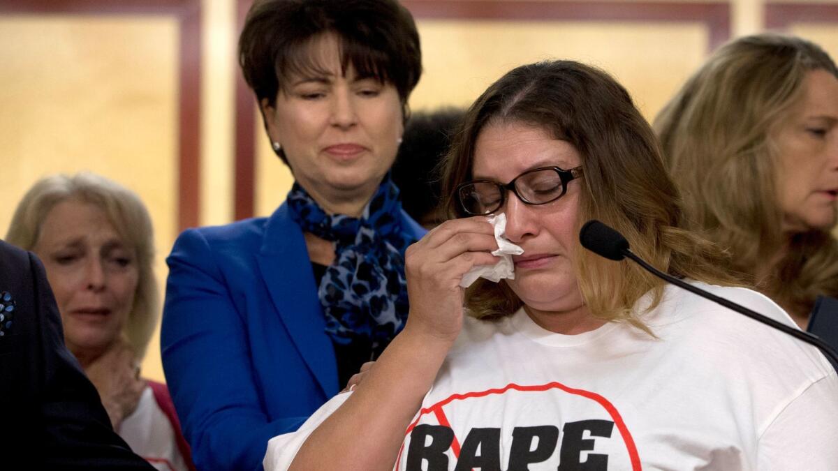 Norma Hernandez wipes her eyes as she talks about being raped when she was 13. The stories of women who say they were sexually assaulted by comedian Bill Cosby prompted California lawmakers to pass a bill last year to eliminate the state's 10-year limit on filing rape.