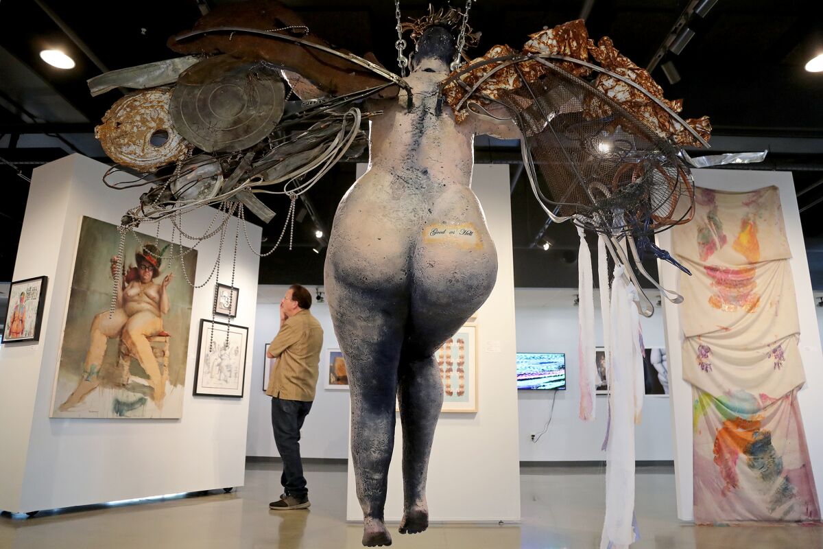 A rear view of mixed-media sculpture "Good as Hell," part of a new exhibit at Coastline Art Gallery in Newport Beach.