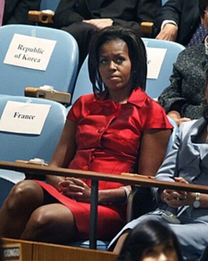 The first lady wore a shiny red Michael Kors number when her husband spoke at the 64th session of the General Assembly at United Nations headquarters.