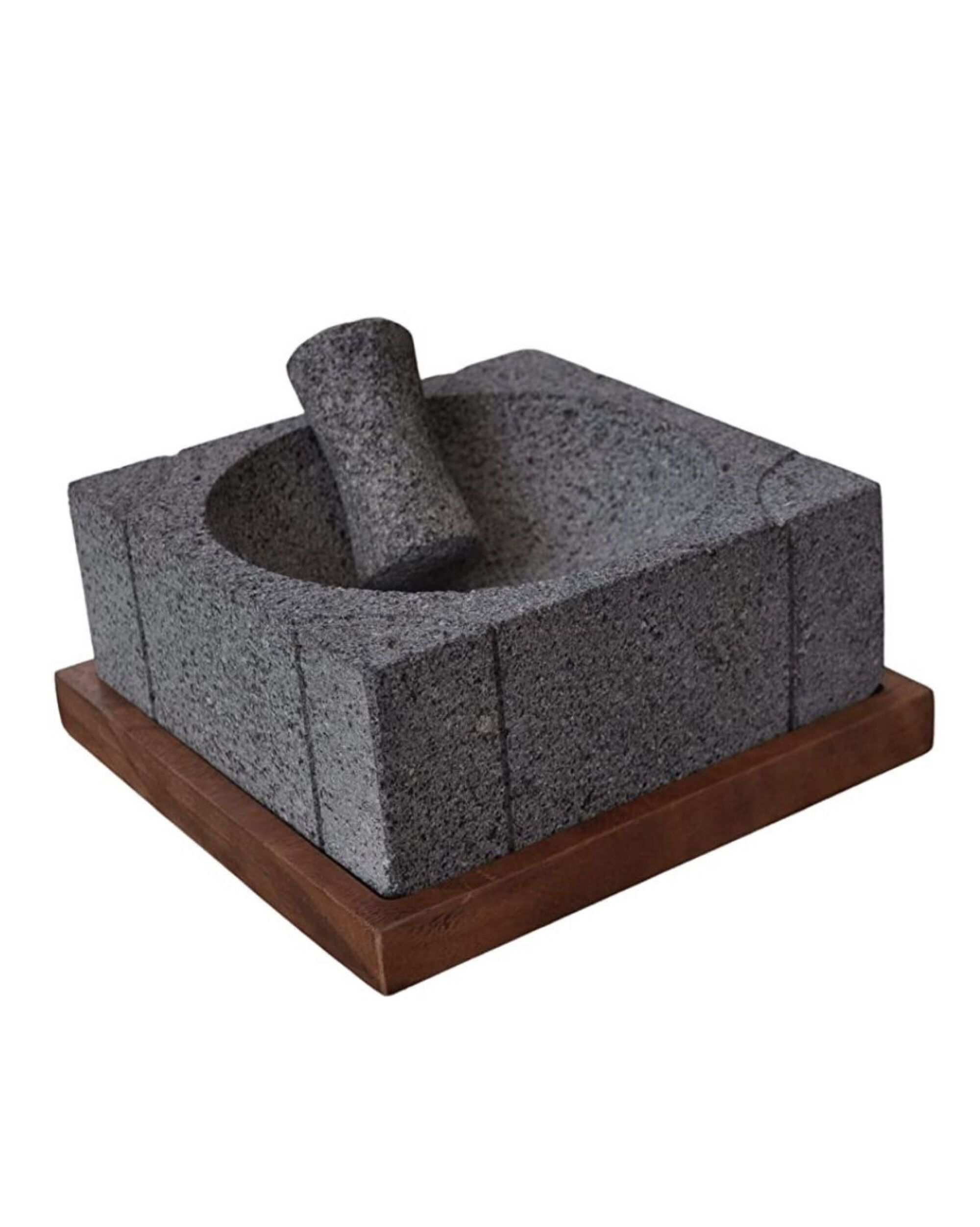 The molcajete nahum volcanic stone parota with a wood base from Cemcui 