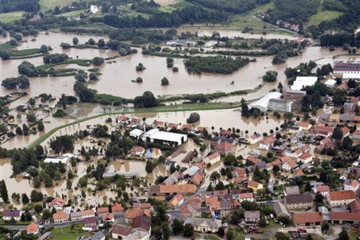 Aerial view of swollen Neisse river with the town of Ostritz, Germany, photographed on Sunday Aug. 8, 2010. The flooding in central Europe has struck an area near the borders of Poland, Germany and the Czech Republic. (AP Photo/ddp/ Jens Schlueter)