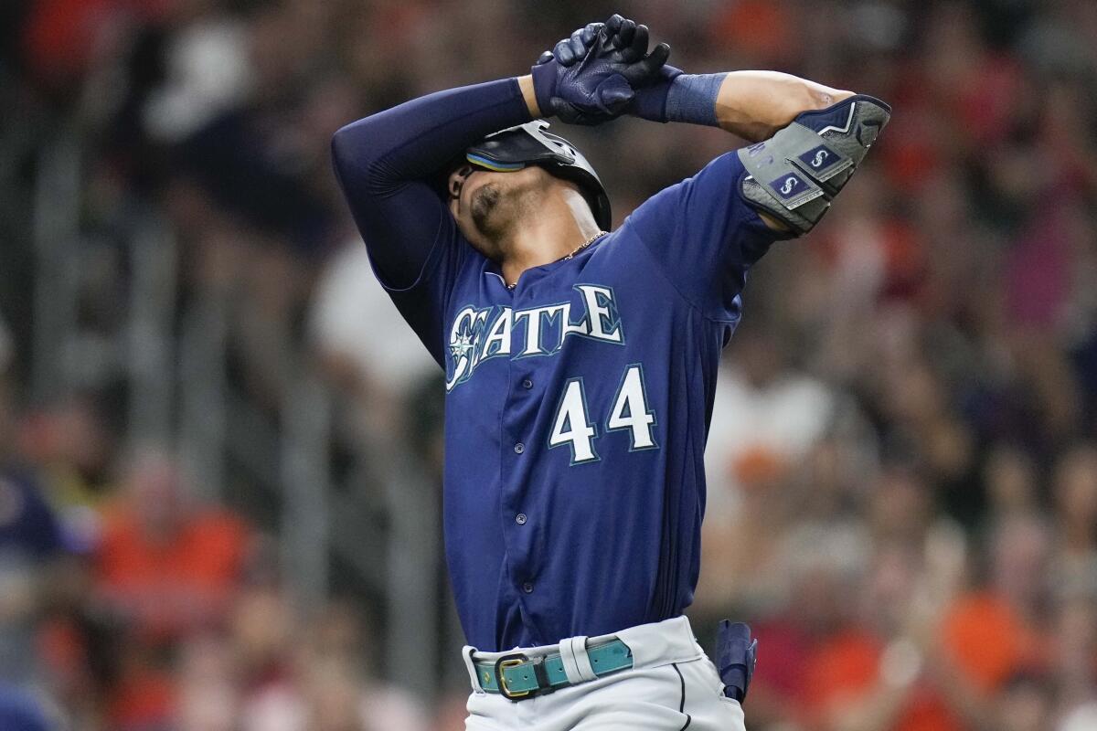Seattle Mariners' Julio Rodriguez reacts after striking out during the eighth inning of the team's baseball game against the Houston Astros, Saturday, July 30, 2022, in Houston. (AP Photo/Eric Christian Smith)