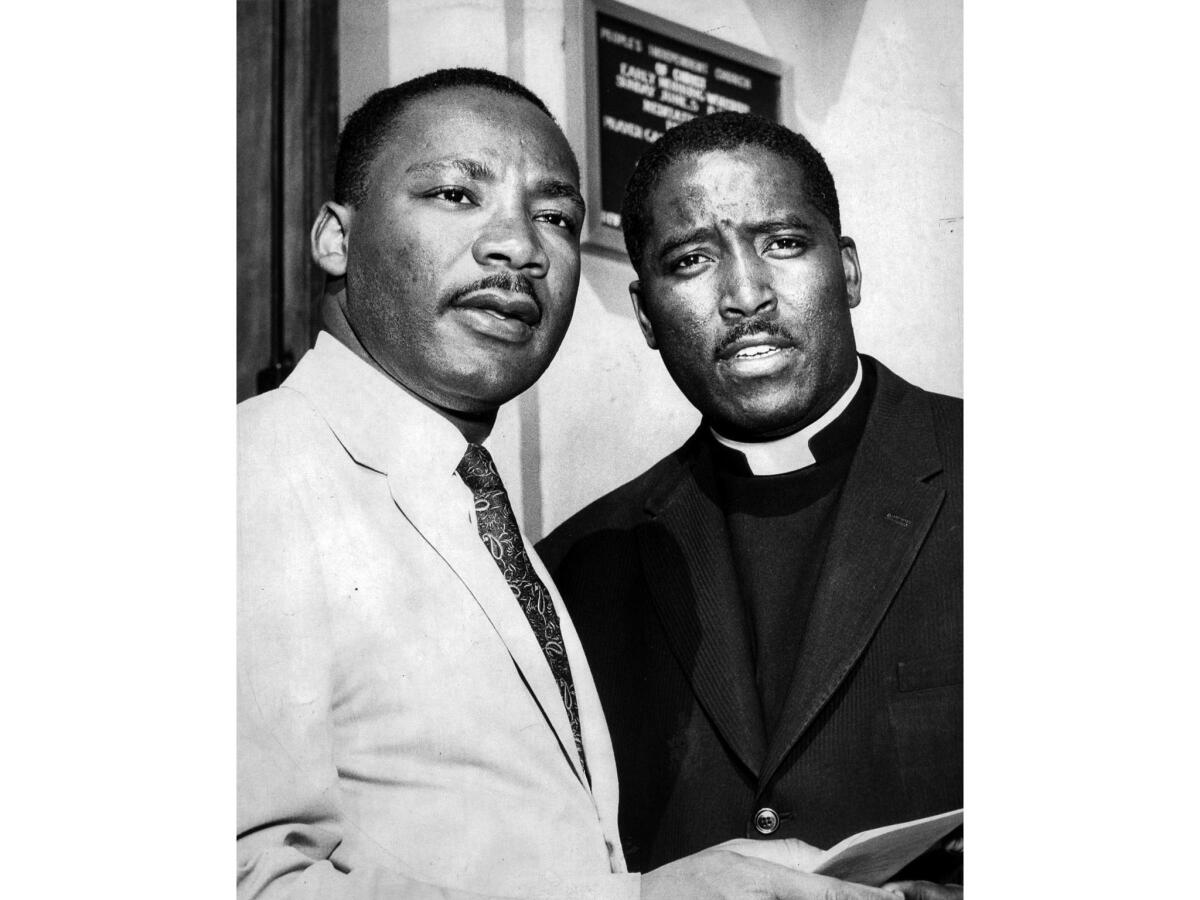 July 9, 1960: King with the Rev. Maurice Dawkins of the People's Independent Church of Christ when King was in Los Angeles for a Civil Rights rally and the Democratic National Convention.