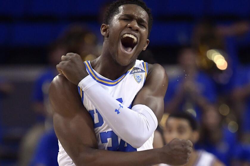 UCLA guard David Singleton celebrates as time runs out in the team's NCAA college basketball game against Stanford on Thursday, Jan. 3, 2019, in Los Angeles. UCLA won 92-70. (AP Photo/Mark J. Terrill)