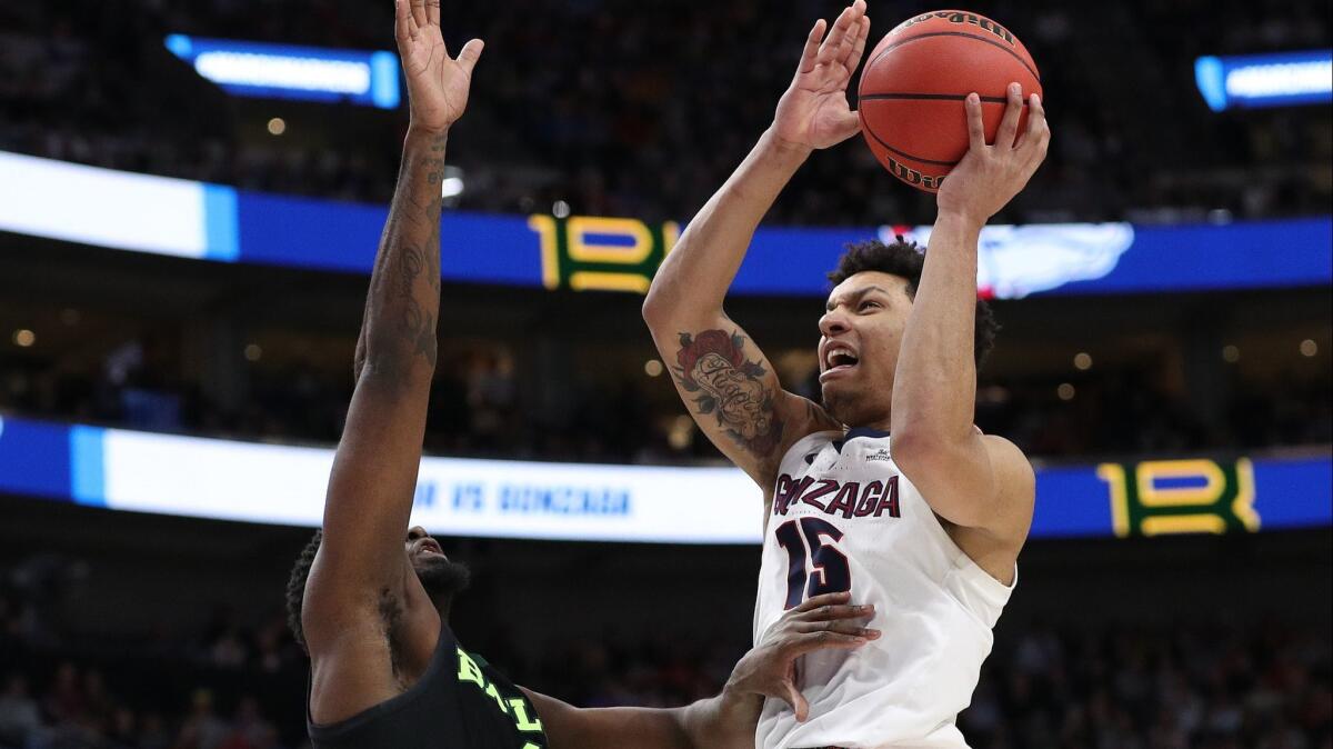 Gonzaga's Brandon Clarke (15) goes up for a shot against Baylor's Mario Kegler (4) during the second round of the NCAA tournament on Saturday in Salt Lake City.