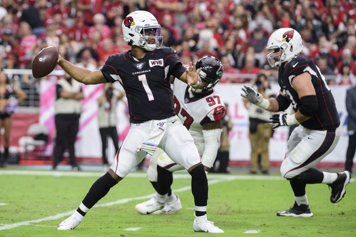 Arizona Cardinals quarterback Kyler Murray looks to pass in the second half against the Atlanta Falcons at State Farm Stadium on Sunday in Glendale, Ariz.