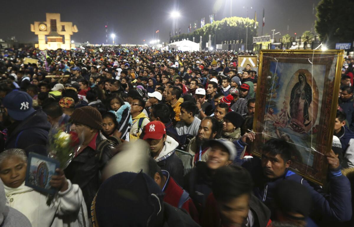 Pilgrims arrive at the Basilica of Our Lady of Guadalupe in 2019