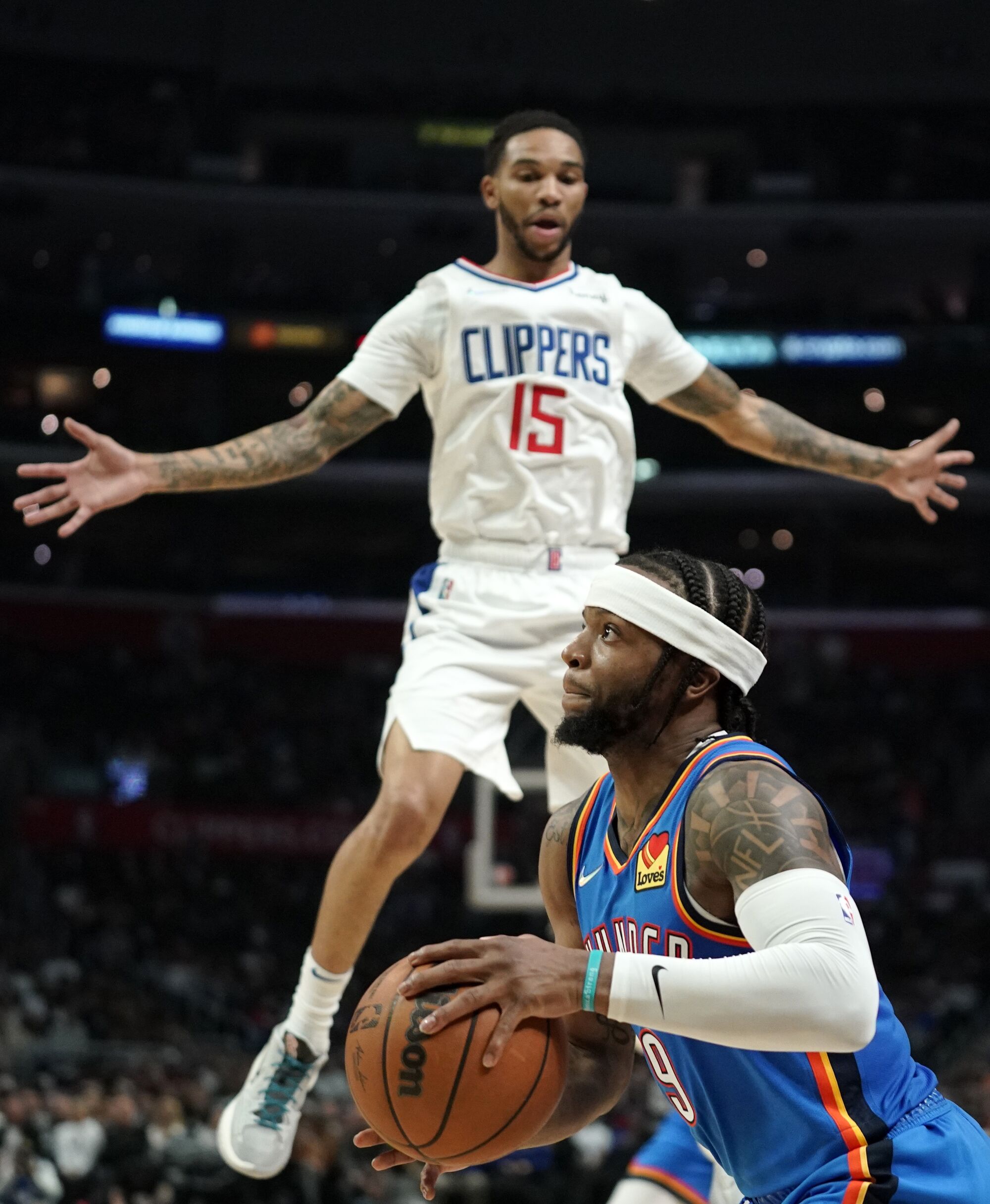 Clippers guard Xavier Moon closes out on defense against Thunder guard Zavier Simpson, who is forced to drive.