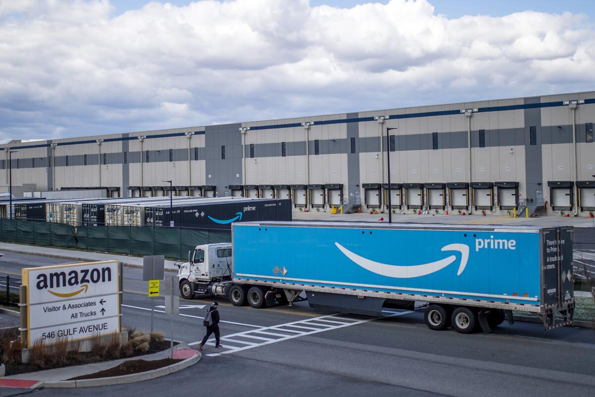 A truck arrives at an Amazon warehouse in New York's Staten Island