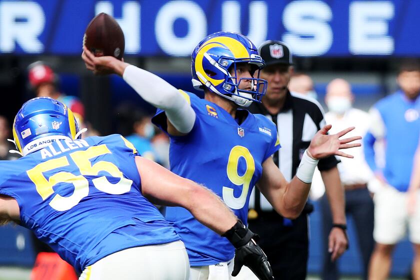 INGLEWOOD, CALIF. - OCT. 24, 2021. Rams quarterback Matt Stafford throws a pass.