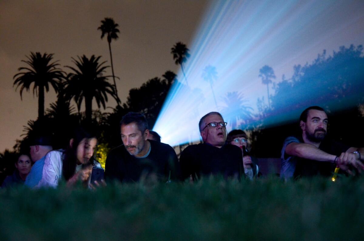 Audience members spread out on the lawn for Cinespia movie screenings at Hollywood Forever Cemetery in Los Angeles.