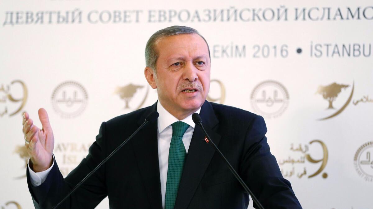 Turkish President Recep Tayyip Erdogan delivers a speech during the opening ceremony of 9th Eurasian Islamic Council in Istanbul on Tuesday.