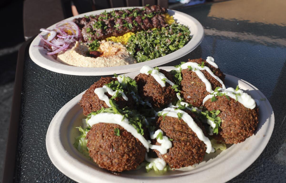 Falafels and a Wagyu beef kabob plate at the Shawarma Guys food truck in the South Park neighborhood of San Diego.