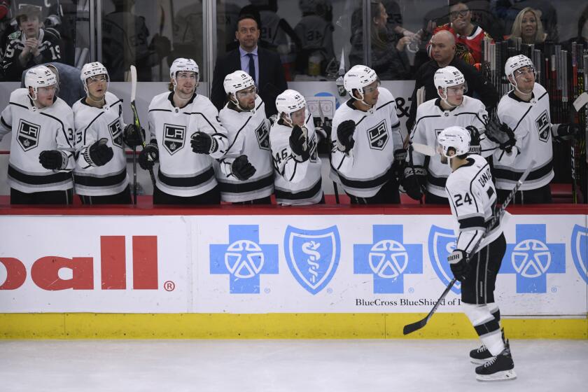 Los Angeles Kings center Phillip Danault (24) is congratulated for his goal.