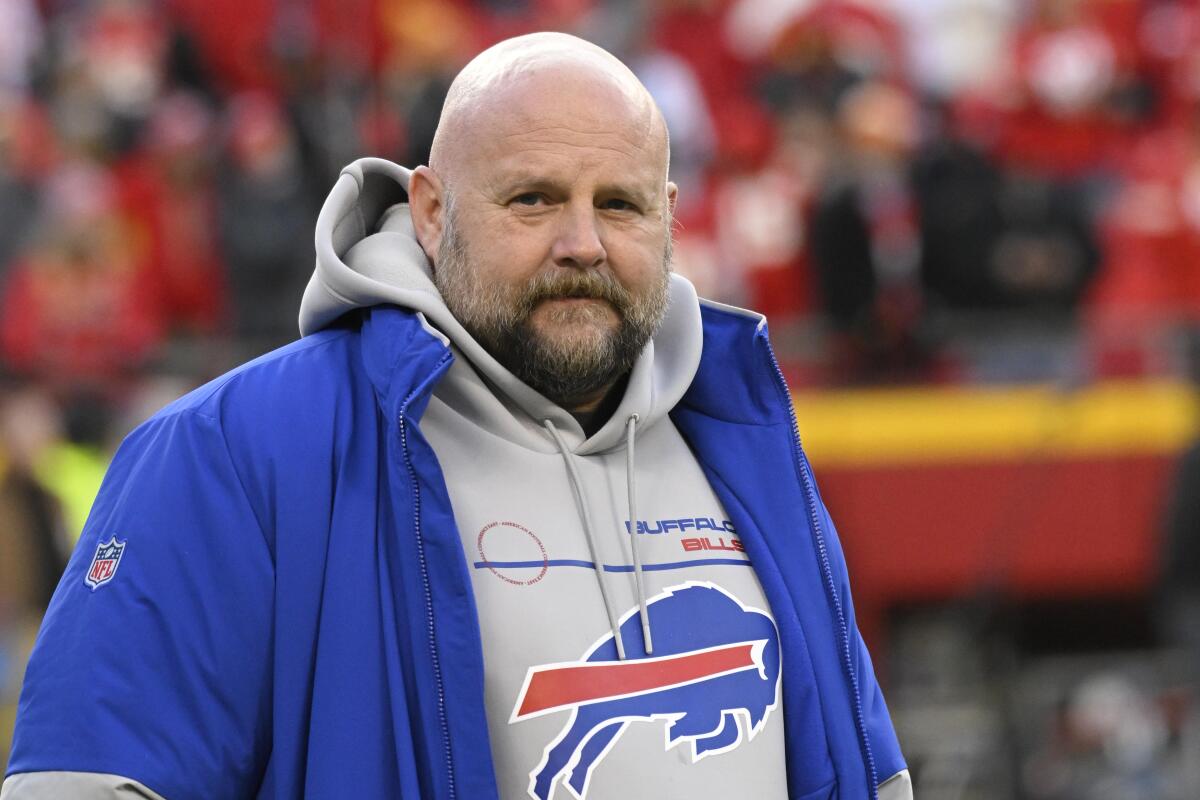Brian Daboll is pictured during warmups before the Buffalo Bills' playoff loss at Kansas City on Jan. 23, 2022.